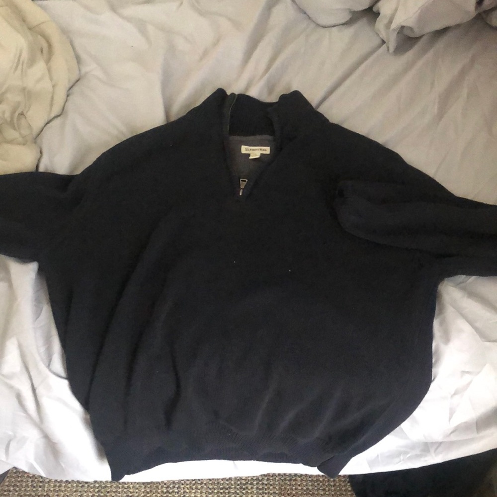 Nice looking sweater and fits comfortably